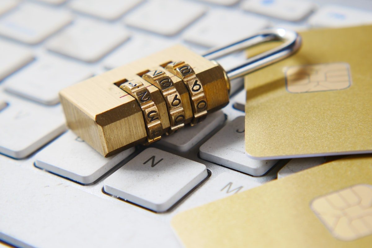 Golden padlock on a computer keyboard symbolizing cybersecurity protection and data safety