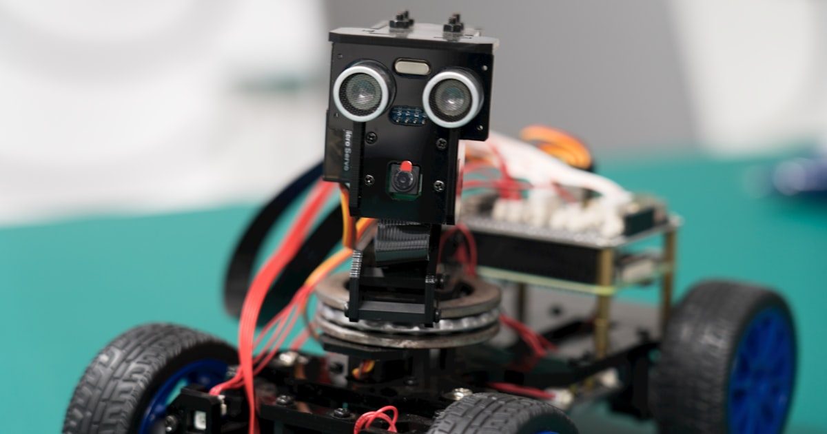 Robot figure representing automated bot detection and digital fraud analysis
