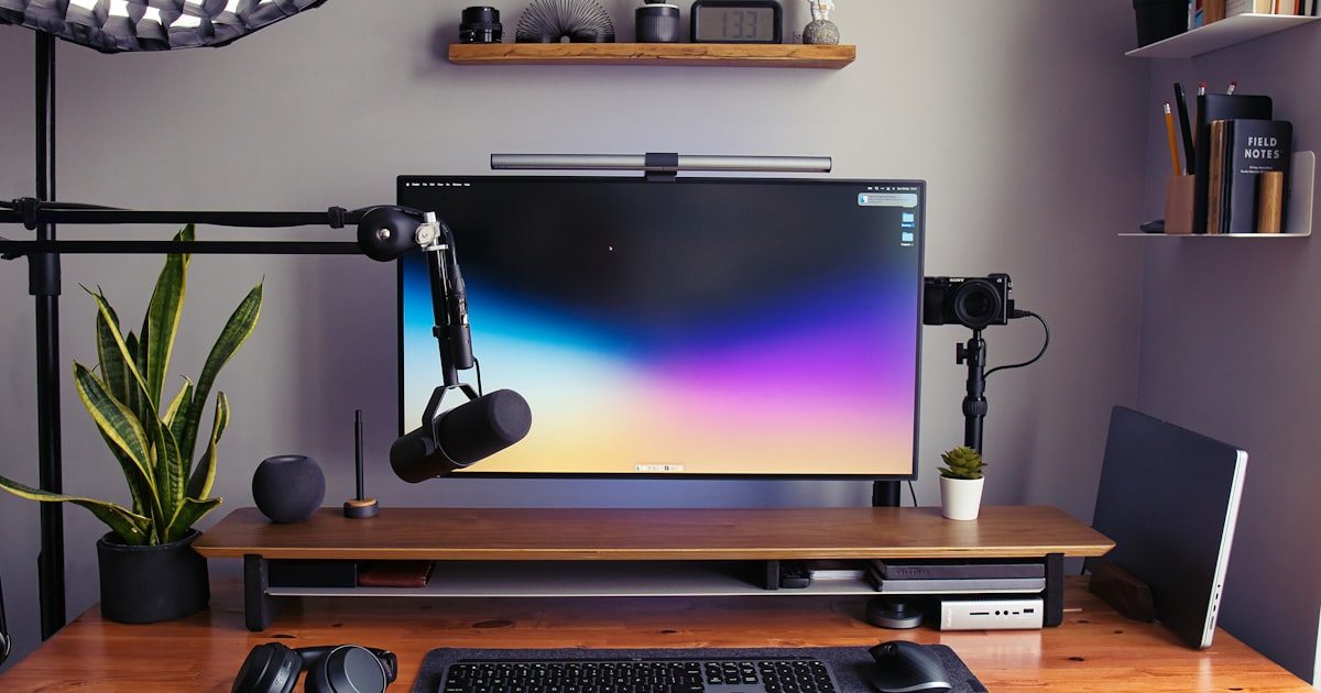 Home office desk setup with computer monitor and peripherals