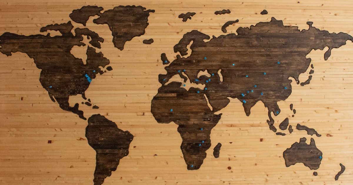 Grayscale desk globe representing global DNS infrastructure